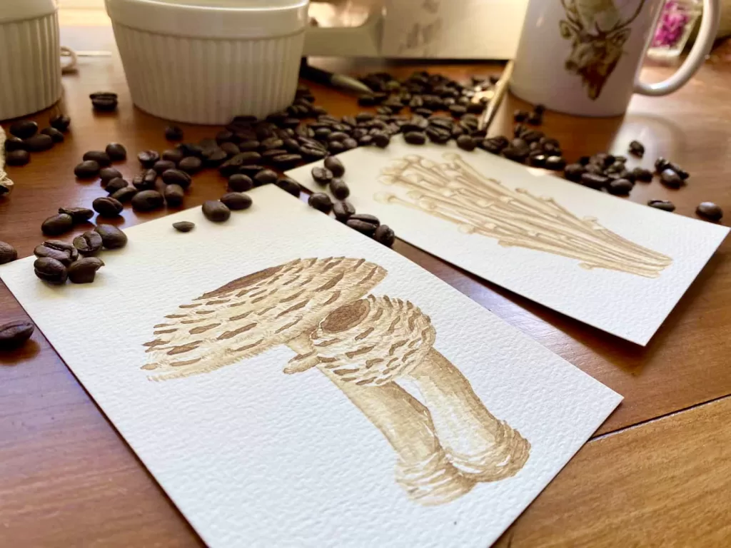 espresso paintings surrounded by coffee beans