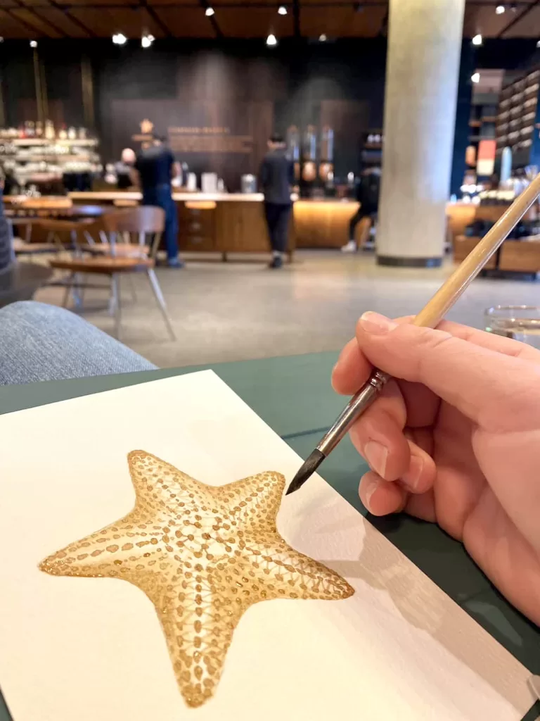 Painting with espresso coffee inside Starbucks reserve shop
